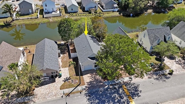 bird's eye view featuring a residential view and a water view