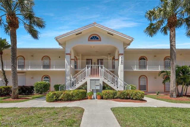 529 Mardel Dr Unit 311, Naples, FL 34104 - view of property with stairs