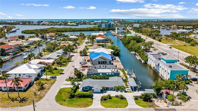 aerial view with a water view and a residential view