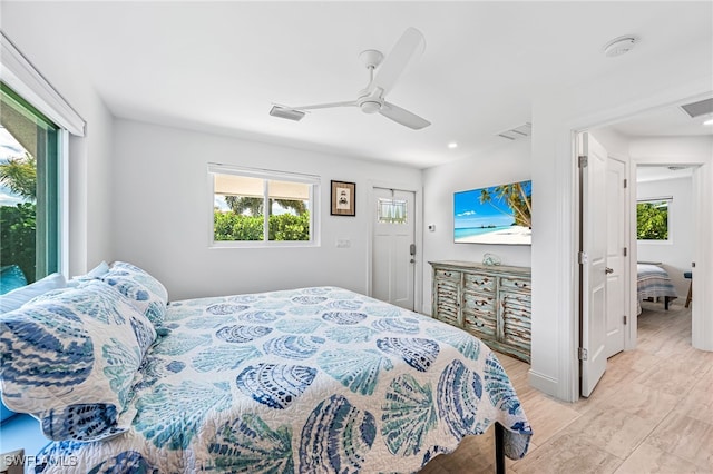 bedroom with visible vents and a ceiling fan