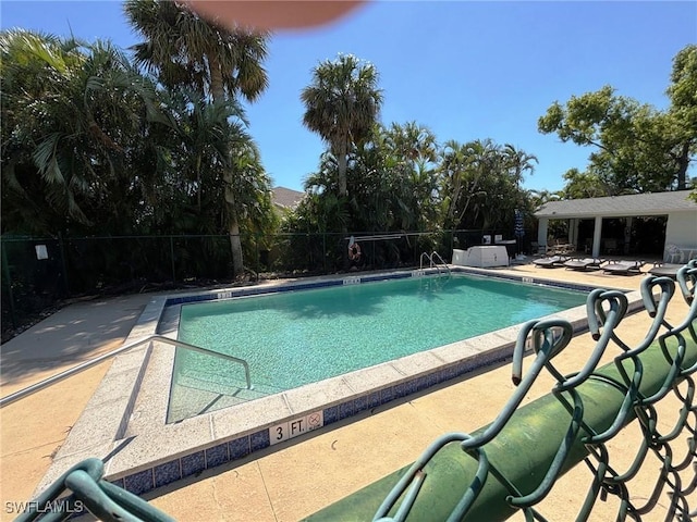 4903 Vincennes St Unit 116, Cape Coral, FL 33904 - pool featuring fence and a patio area