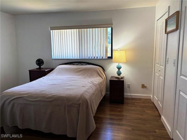 4903 Vincennes St Unit 116, Cape Coral, FL 33904 - bedroom featuring dark wood-type flooring and baseboards