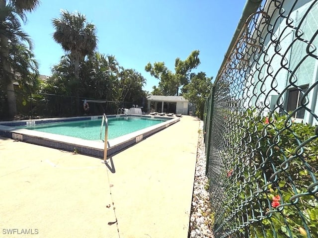 4903 Vincennes St Unit 116, Cape Coral, FL 33904 - community pool featuring fence and a patio