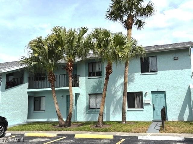 4903 Vincennes St Unit 116, Cape Coral, FL 33904 - view of property with uncovered parking