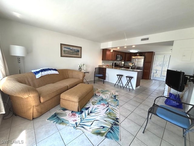 4903 Vincennes St Unit 116, Cape Coral, FL 33904 - living room with light tile patterned flooring and visible vents