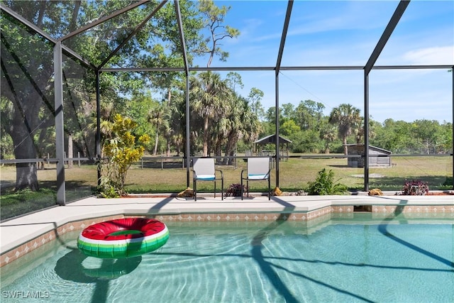 3641 4th Ave SE, Naples, FL 34117 - pool featuring glass enclosure, a patio, and a lawn