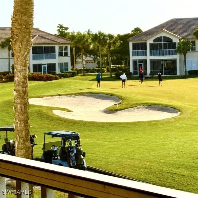 view of community with a yard