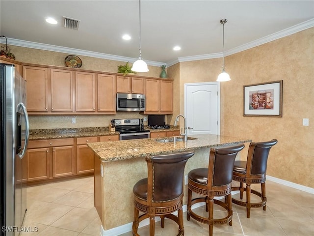 20240 Black Tree Ln, Estero, FL 33928 - kitchen with visible vents, crown molding, light stone counters, stainless steel appliances, and a sink