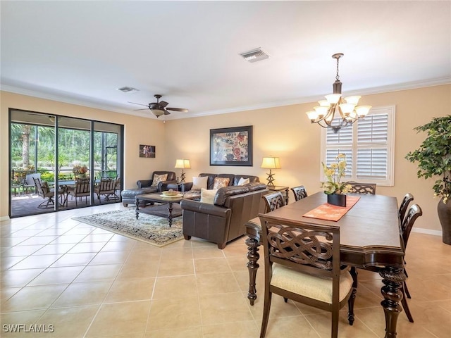 20240 Black Tree Ln, Estero, FL 33928 - dining space featuring light tile patterned flooring, ceiling fan with notable chandelier, visible vents, and ornamental molding