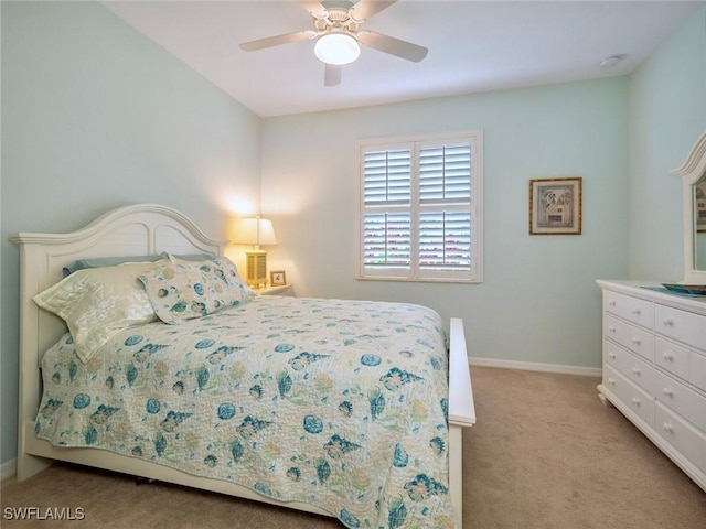 20240 Black Tree Ln, Estero, FL 33928 - bedroom featuring light carpet, ceiling fan, and baseboards