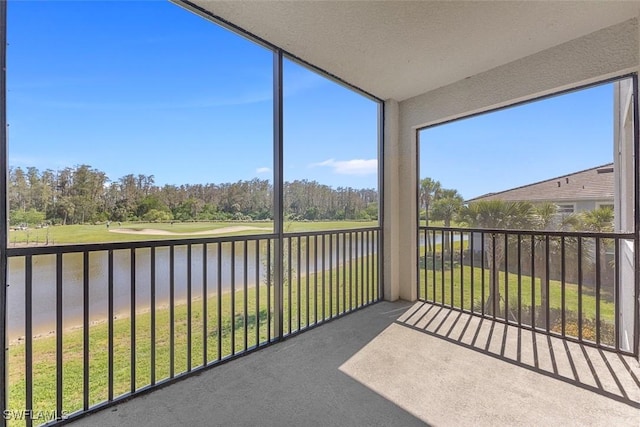 6058 National Blvd Unit 327, Ave Maria, FL 34142 - sunroom / solarium with a water view