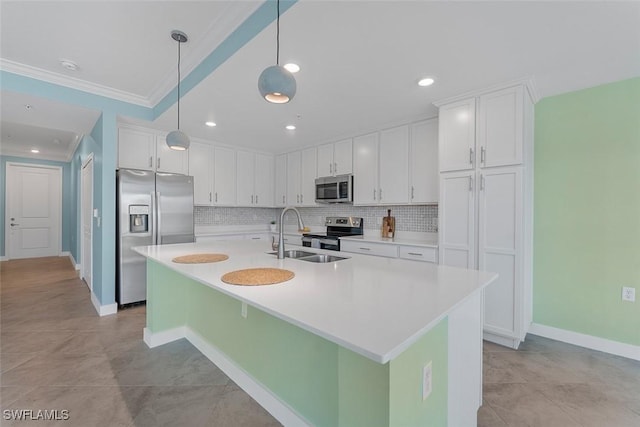 6058 National Blvd Unit 327, Ave Maria, FL 34142 - kitchen featuring a sink, decorative backsplash, white cabinetry, and stainless steel appliances