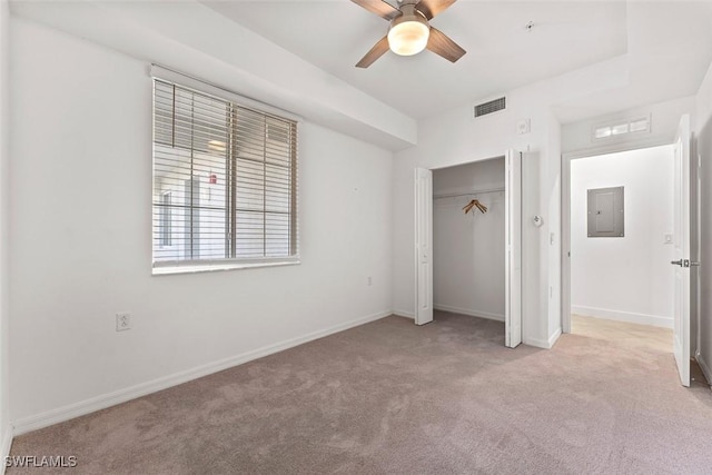6058 National Blvd Unit 327, Ave Maria, FL 34142 - unfurnished bedroom featuring visible vents, baseboards, light carpet, electric panel, and a closet