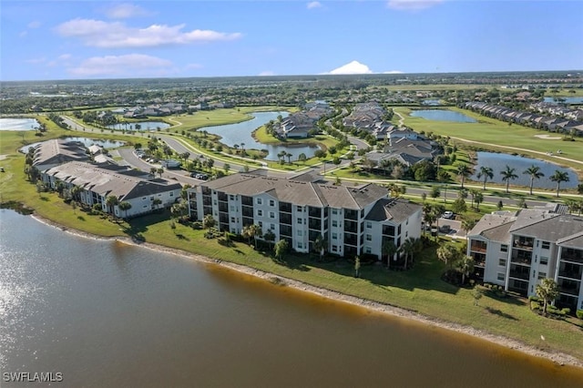6058 National Blvd Unit 327, Ave Maria, FL 34142 - drone / aerial view with a water view