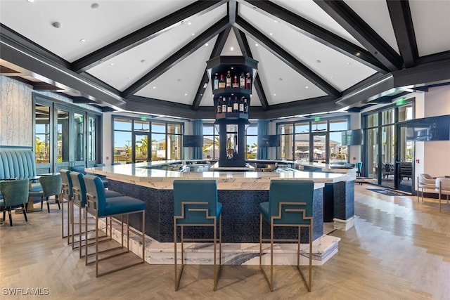 6058 National Blvd Unit 327, Ave Maria, FL 34142 - interior space with beam ceiling, a high ceiling, and french doors