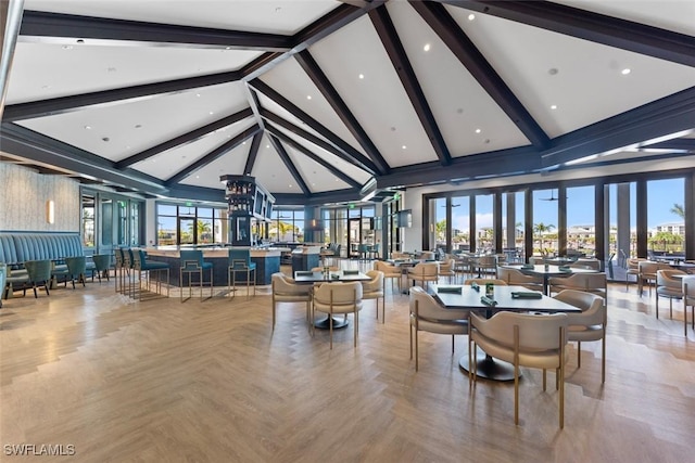 6058 National Blvd Unit 327, Ave Maria, FL 34142 - dining room featuring beam ceiling and high vaulted ceiling