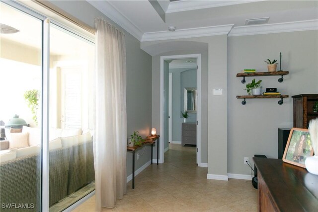 2604 Stonyhill Ct, Cape Coral, FL 33991 - corridor featuring crown molding, visible vents, baseboards, and light tile patterned floors