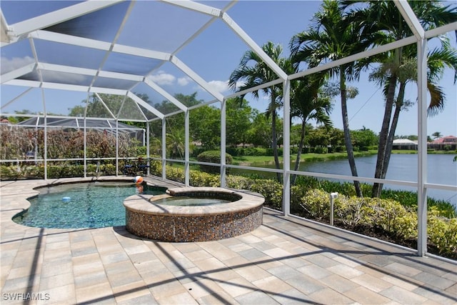 2604 Stonyhill Ct, Cape Coral, FL 33991 - view of swimming pool with a water view, a patio, a pool with connected hot tub, and a lanai