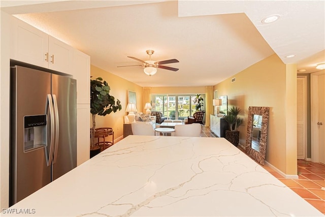 325 Charlemagne Blvd Unit A108, Naples, FL 34112 - bedroom featuring stainless steel fridge with ice dispenser, light tile patterned flooring, baseboards, recessed lighting, and a ceiling fan