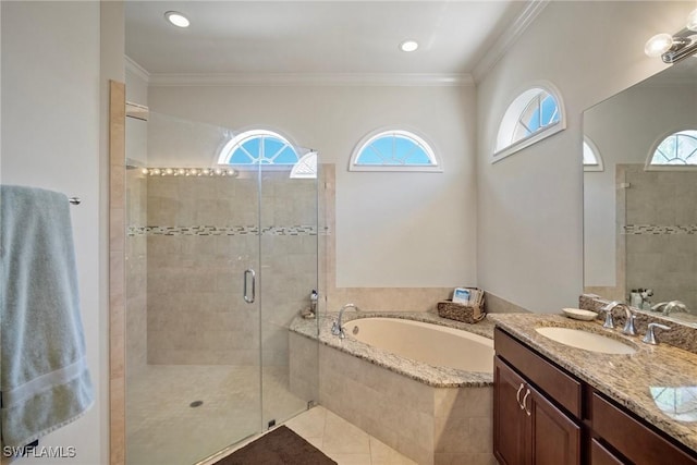 9846 Weather Stone Pl, Fort Myers, FL 33913 - full bath with a shower stall, a garden tub, healthy amount of natural light, vanity, and ornamental molding