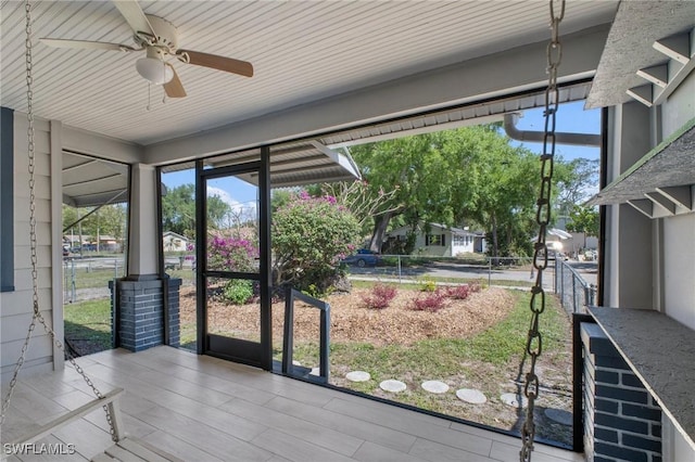 290 Granada Blvd, Fort Myers, FL 33905 - unfurnished sunroom featuring a ceiling fan and a healthy amount of sunlight