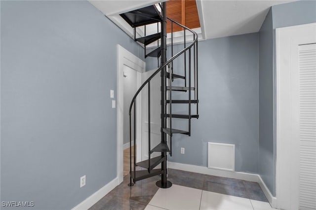 290 Granada Blvd, Fort Myers, FL 33905 - staircase featuring baseboards and tile patterned floors