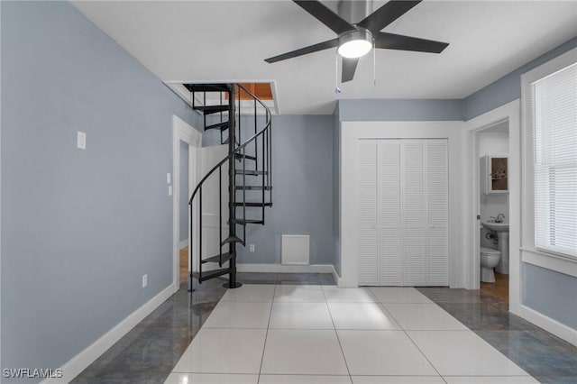 290 Granada Blvd, Fort Myers, FL 33905 - interior space featuring a ceiling fan, baseboards, and stairs