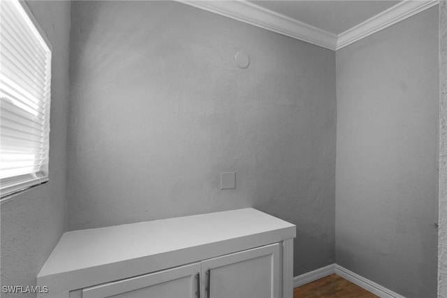 290 Granada Blvd, Fort Myers, FL 33905 - details with a textured wall, ornamental molding, baseboards, and wood finished floors
