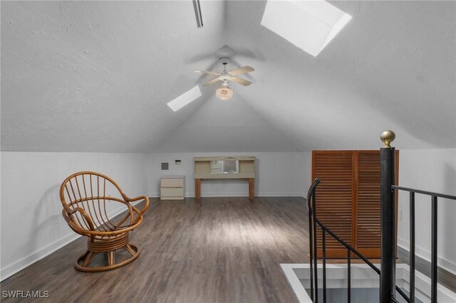 290 Granada Blvd, Fort Myers, FL 33905 - bonus room with lofted ceiling with skylight, baseboards, ceiling fan, and wood finished floors