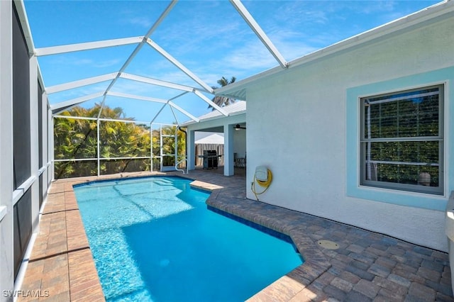 41 5th St, Bonita Springs, FL 34134 - swimming pool with a patio area, a ceiling fan, and a lanai