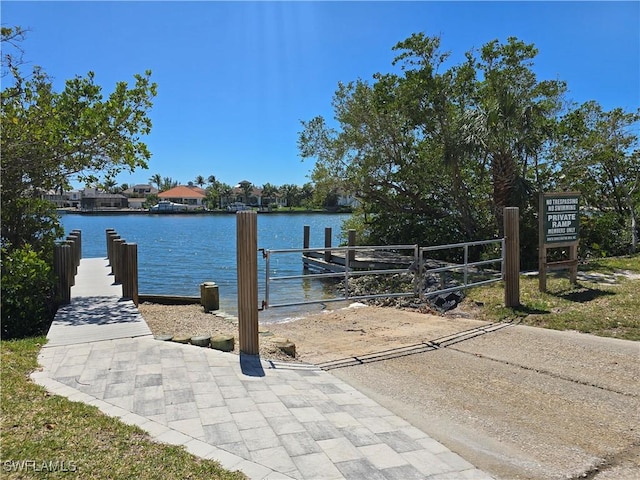 41 5th St, Bonita Springs, FL 34134 - dock area with a water view and a boat ramp