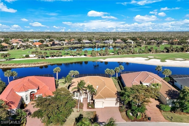 aerial view featuring view of golf course and a water view