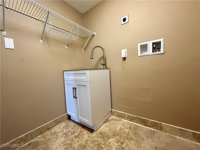 1434 Alhambra Dr, Fort Myers, FL 33901 - washroom with cabinet space, washer hookup, baseboards, and electric dryer hookup