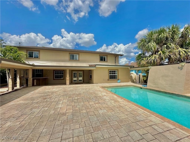 1434 Alhambra Dr, Fort Myers, FL 33901 - outdoor pool featuring a patio area and french doors