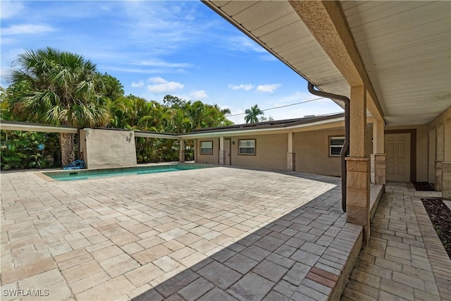 1434 Alhambra Dr, Fort Myers, FL 33901 - view of patio / terrace featuring an outdoor pool
