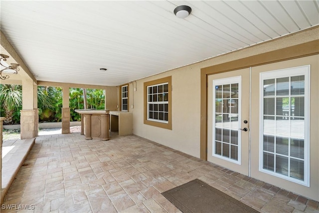 1434 Alhambra Dr, Fort Myers, FL 33901 - view of patio / terrace featuring outdoor dry bar and french doors