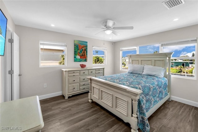 bedroom featuring visible vents, baseboards, recessed lighting, a ceiling fan, and dark wood-type flooring