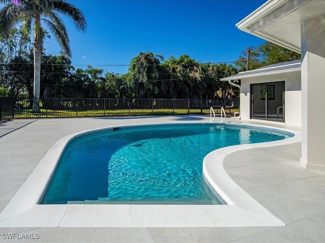 view of pool featuring a fenced in pool, a patio area, and fence