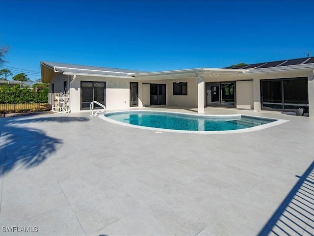 view of pool featuring fence, a patio area, and a fenced in pool