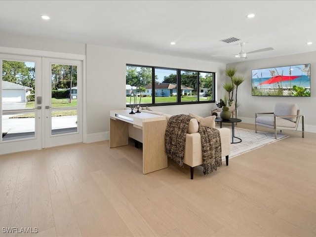 bedroom featuring recessed lighting, light wood-style flooring, access to outside, visible vents, and french doors