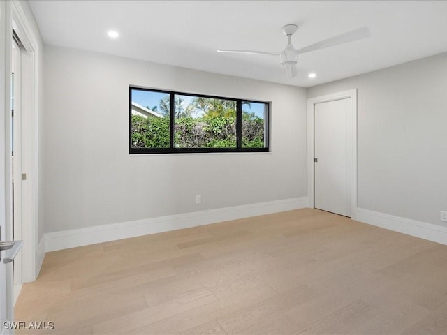 unfurnished bedroom with ceiling fan, recessed lighting, light wood-style flooring, and baseboards