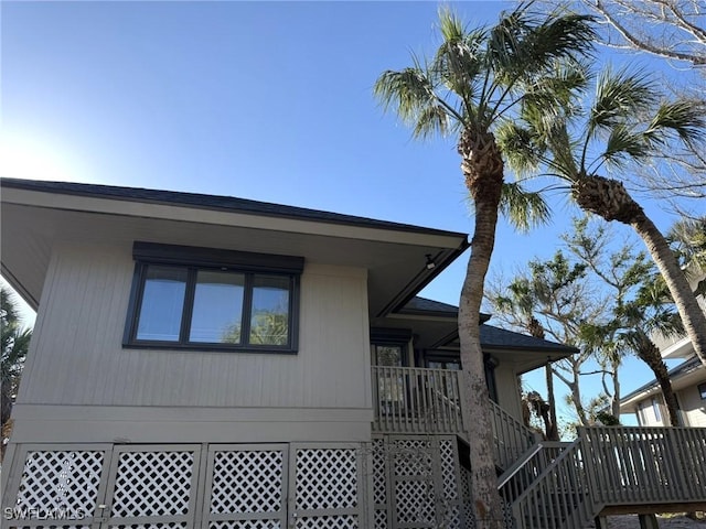 484 Gulf Bend Dr, Captiva, FL 33924 - view of side of property featuring stairway