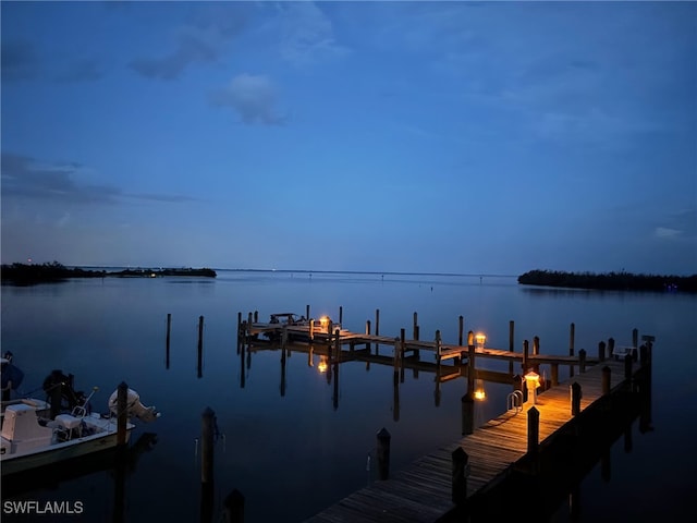 484 Gulf Bend Dr, Captiva, FL 33924 - view of dock featuring a water view