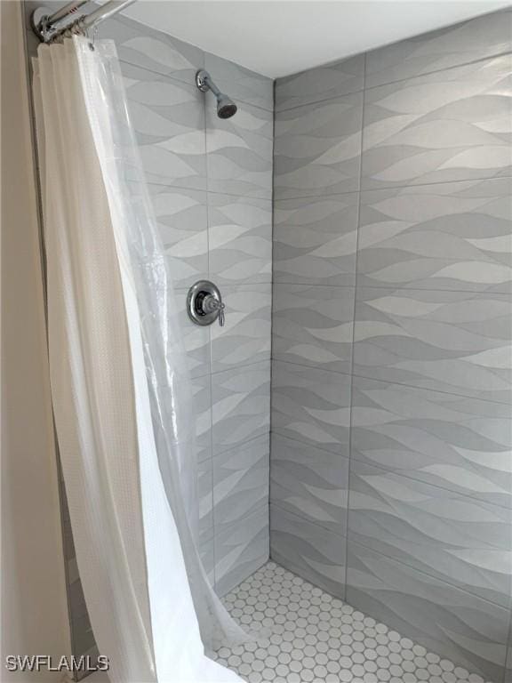 484 Gulf Bend Dr, Captiva, FL 33924 - bathroom with a shower stall