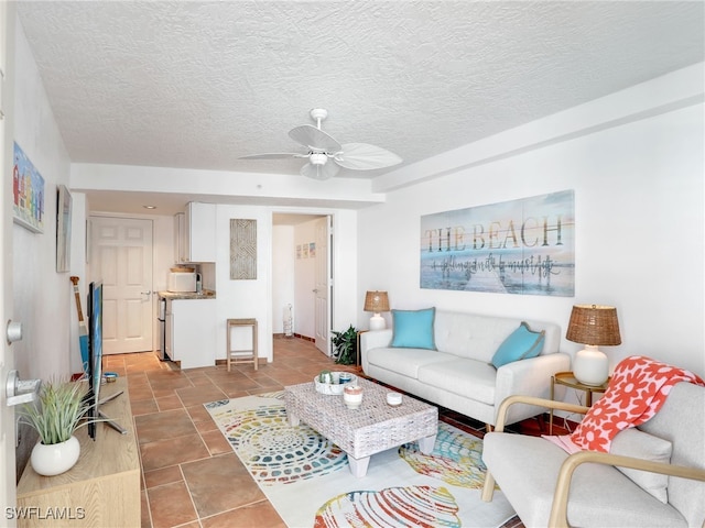 1070 S Collier Blvd Unit 507, Marco Island, FL 34145 - living room with a textured ceiling and ceiling fan