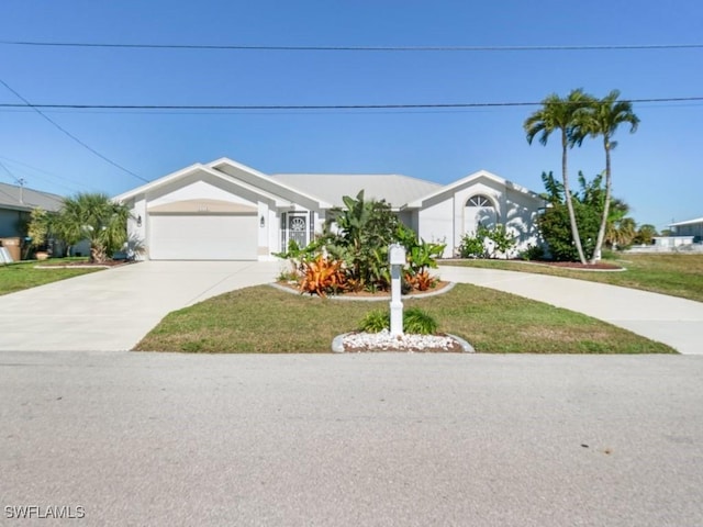 4538 SE 6th Ct, Cape Coral, FL 33904 - single story home with concrete driveway, an attached garage, and a front yard