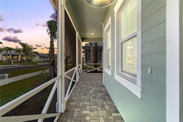 7282 Saona Ct, Naples, FL 34113 - view of balcony at dusk