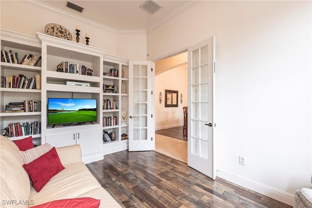 living room featuring visible vents, crown molding, french doors, and dark wood-type flooring