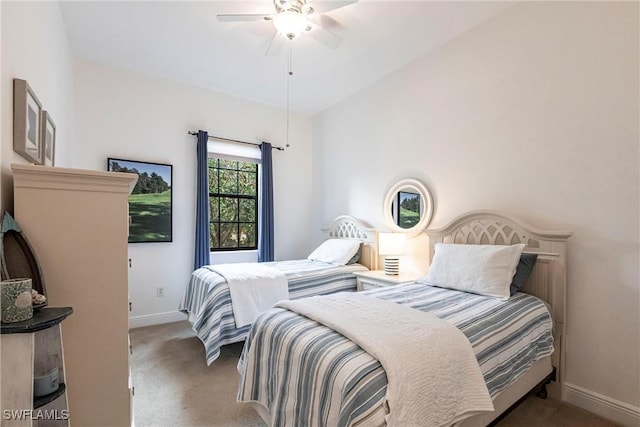 bedroom featuring carpet, baseboards, and ceiling fan
