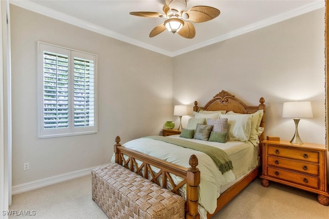 bedroom featuring light colored carpet, crown molding, ceiling fan, and baseboards
